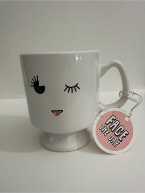 White Ceramic Pedestal Mug with Playful Face